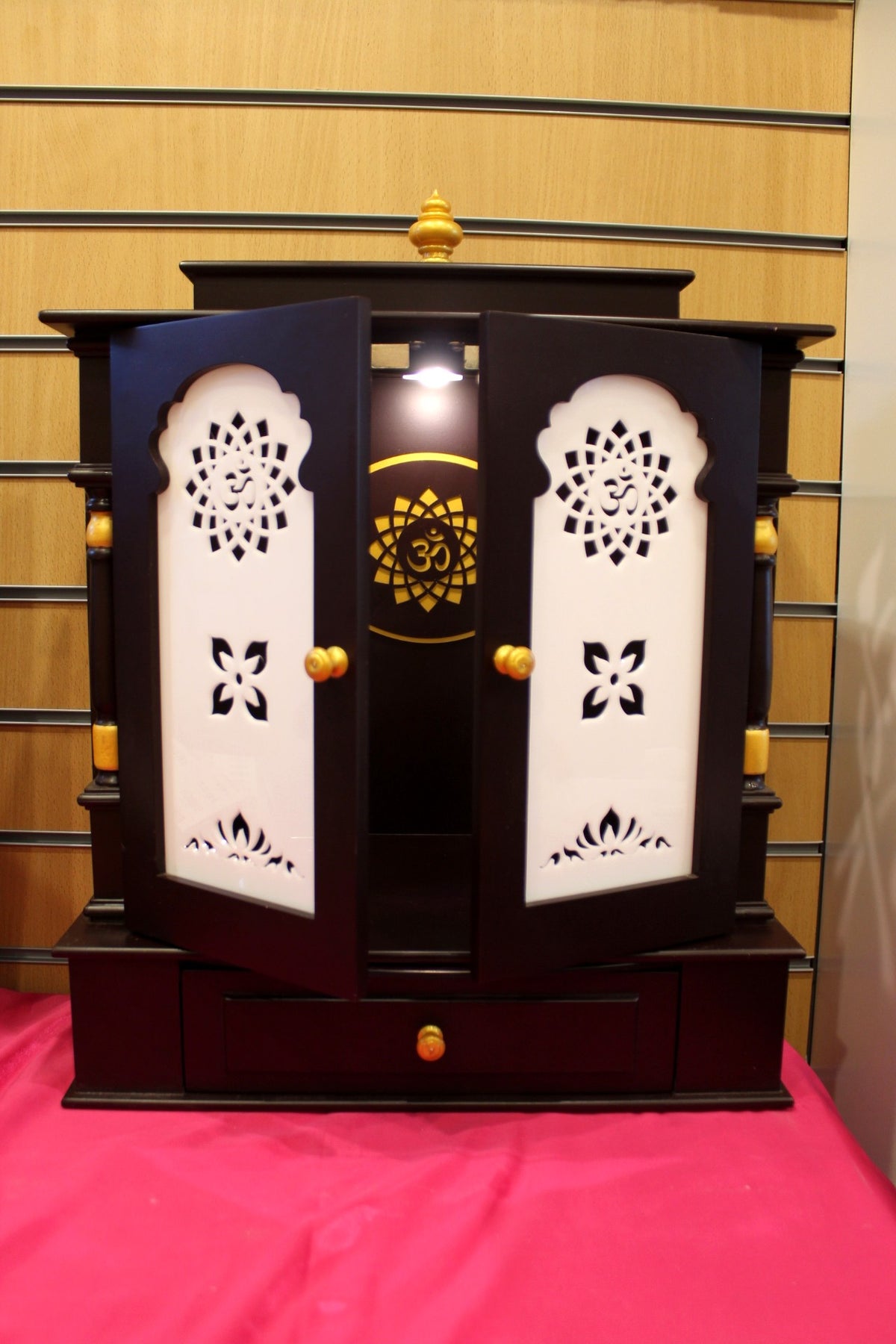 Rear three-quarter view of the puja mandir