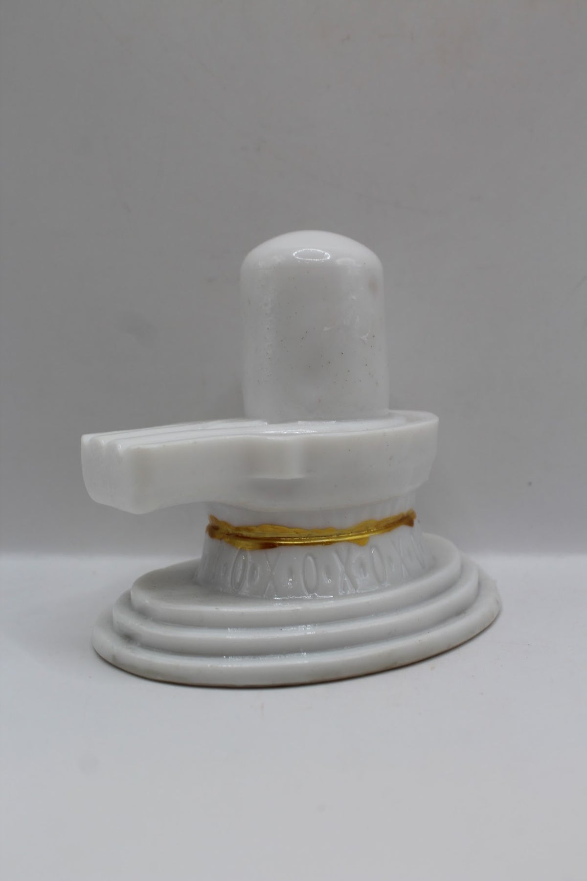 White resin Shivling with tripundra, back view