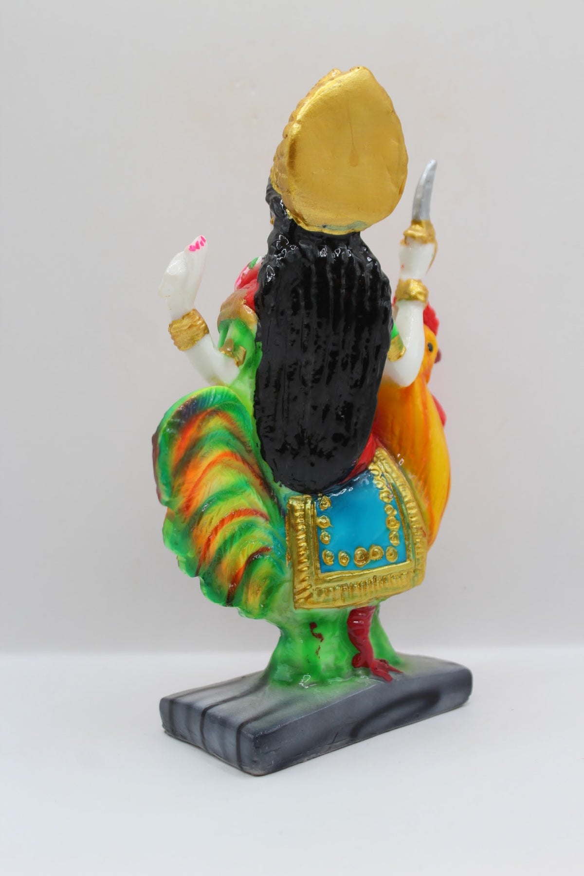 Resin Bahuchar Maa murti riding a rooster, back view