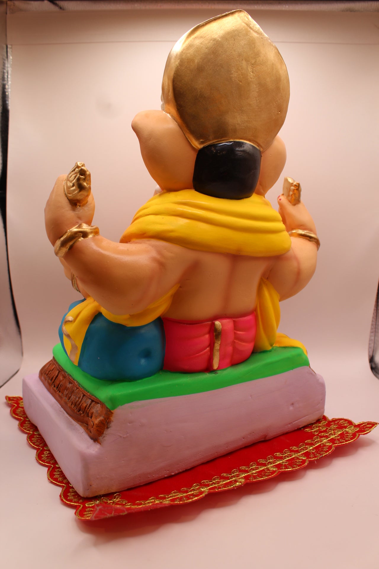 Eco-Friendly Ganesh Visarjan idol, Yellow Khes & Pink Dhoti, Turquoise Bolster, back view
