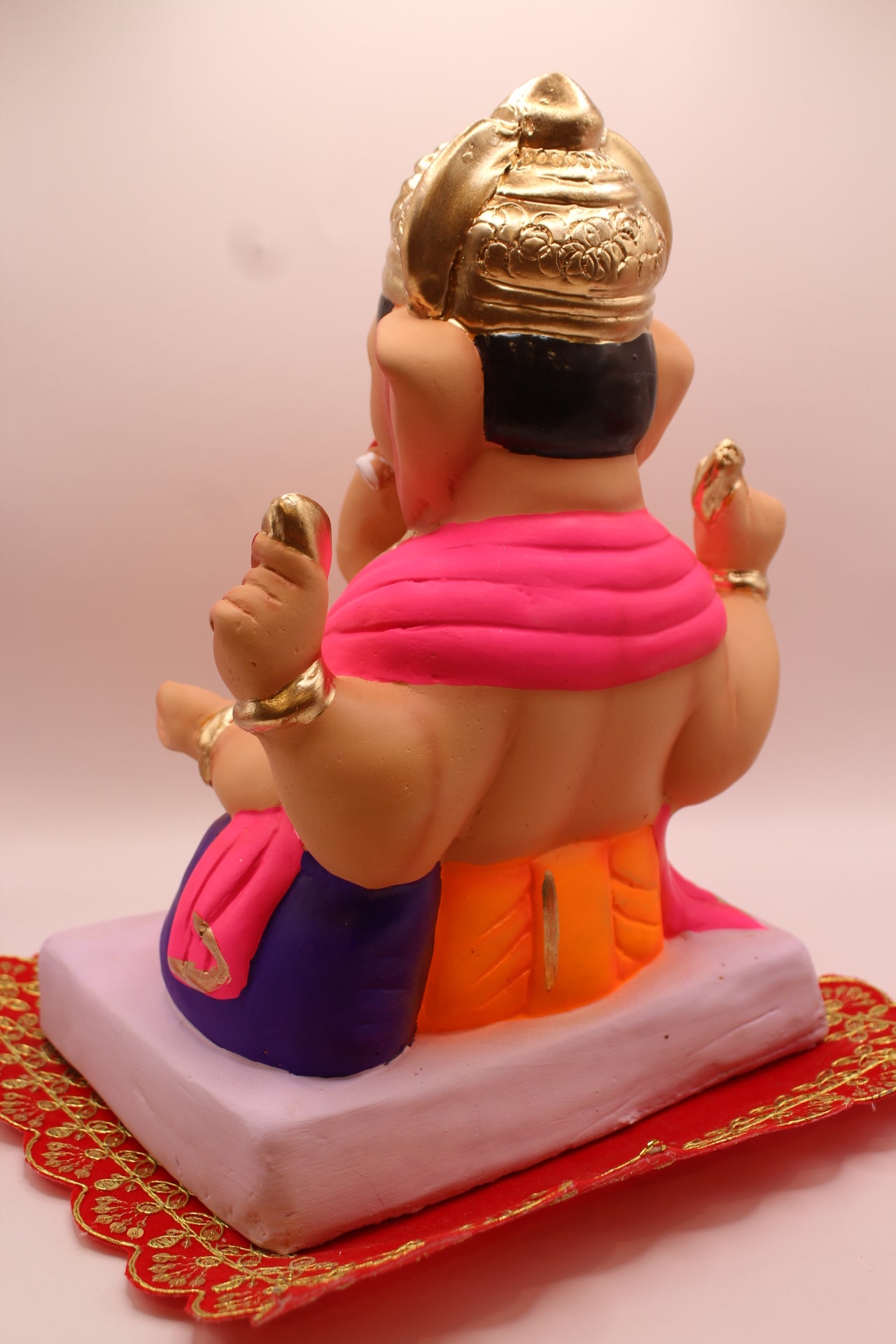 Eco-Friendly Ganesh Visarjan idol, Pink Khes & Orange Dhoti, Purple Bolster, back view