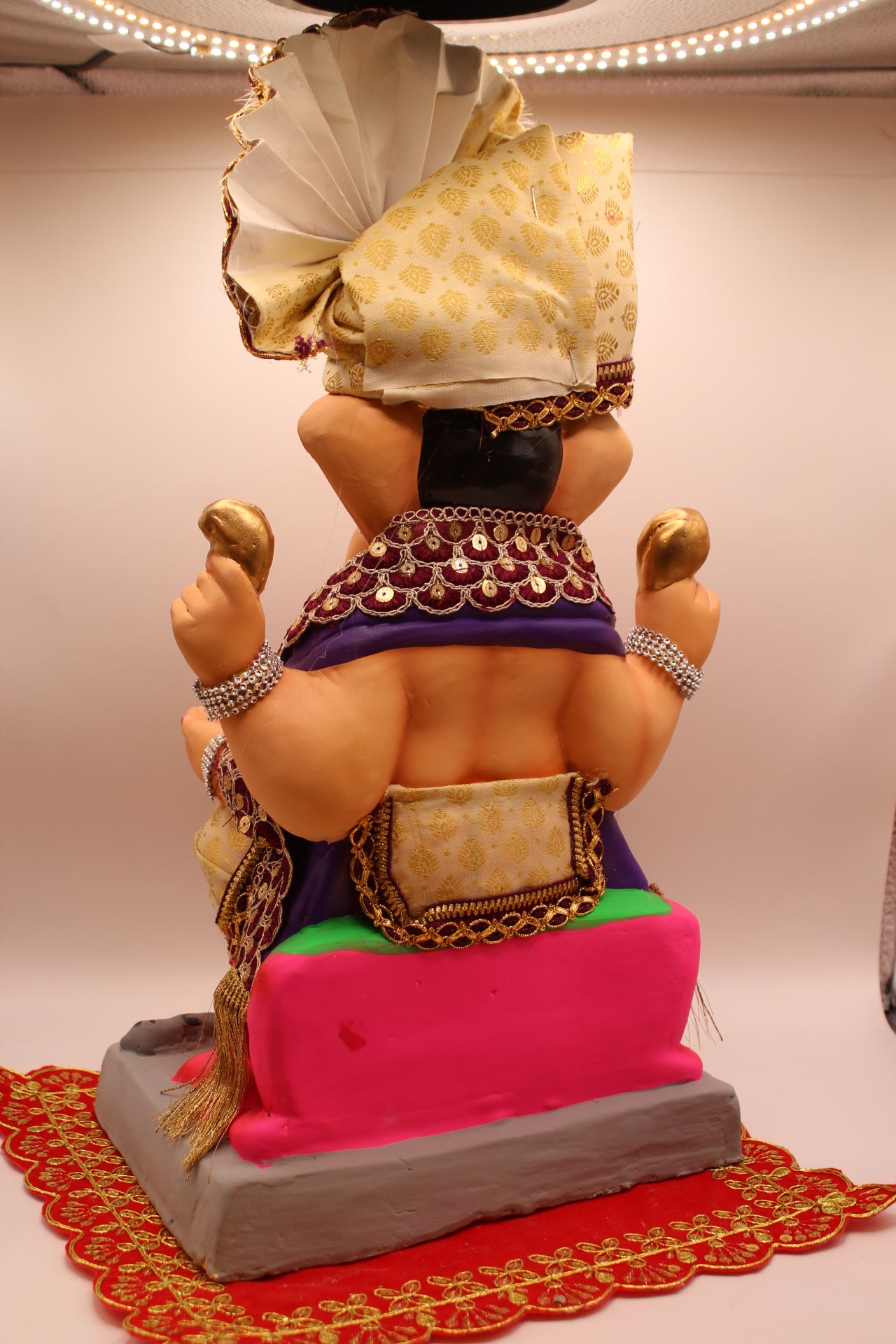 Back view – ivory gold safa set on hot pink lotus mat