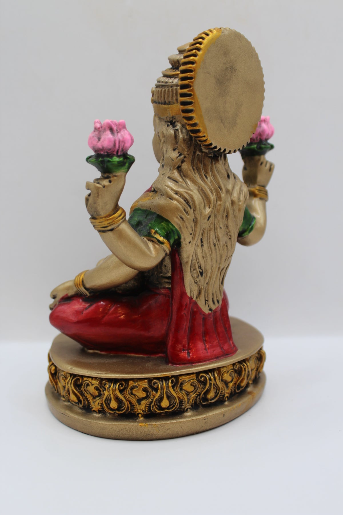 Resin Laxmi statue, with lotus flowers, antique bronze, back view