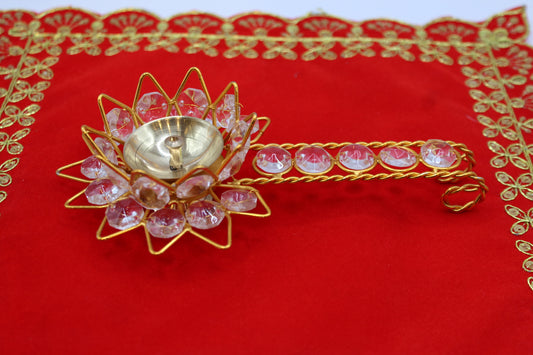 Stone-set lotus aarti diya with jewelled handle
