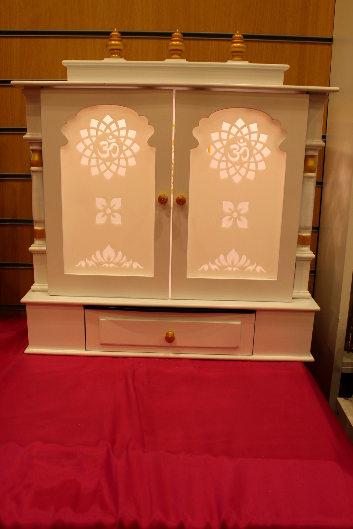 Front view of the cream home temple with base drawer