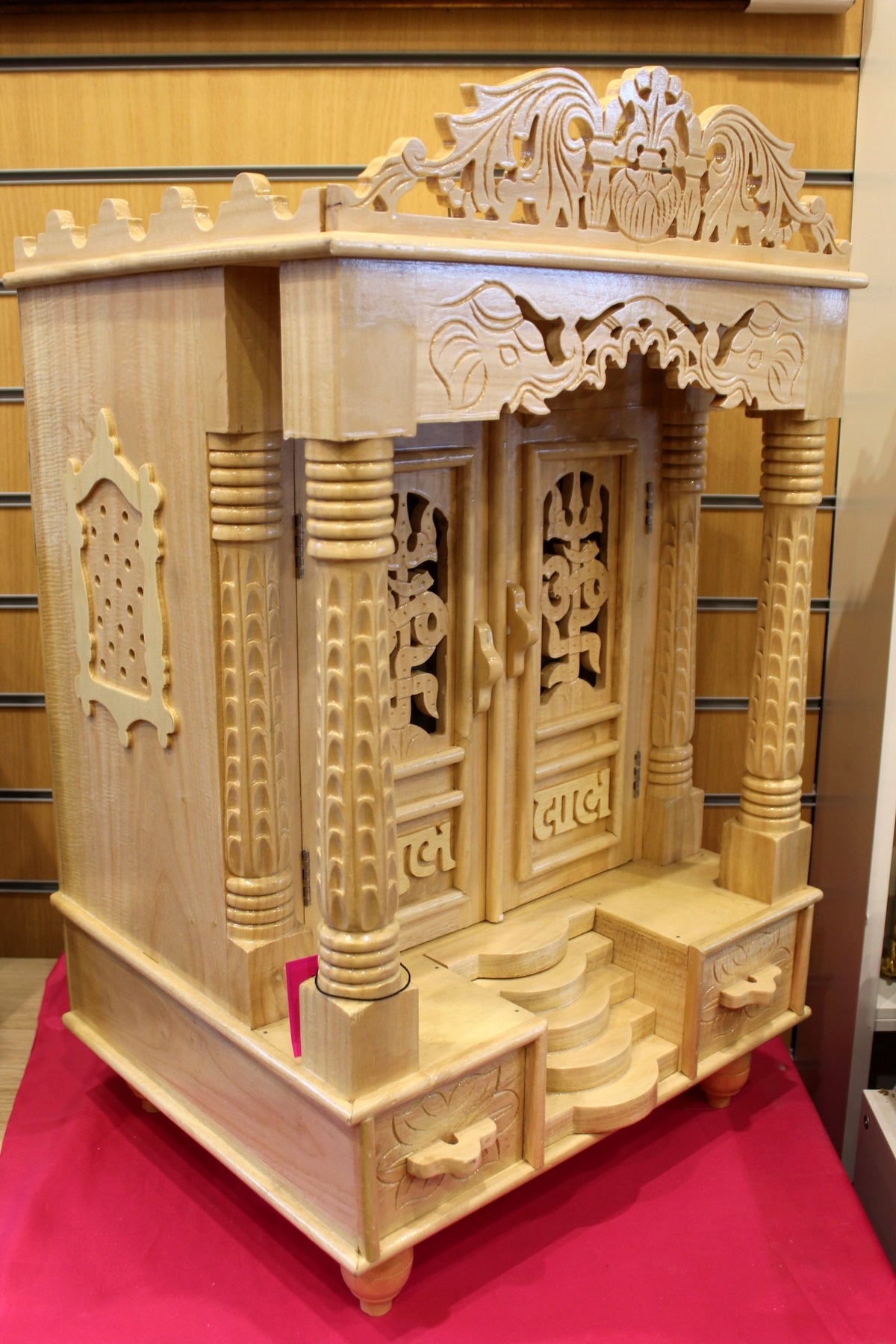 Shubh Labh mandir with doors open showing the stepped inner platform