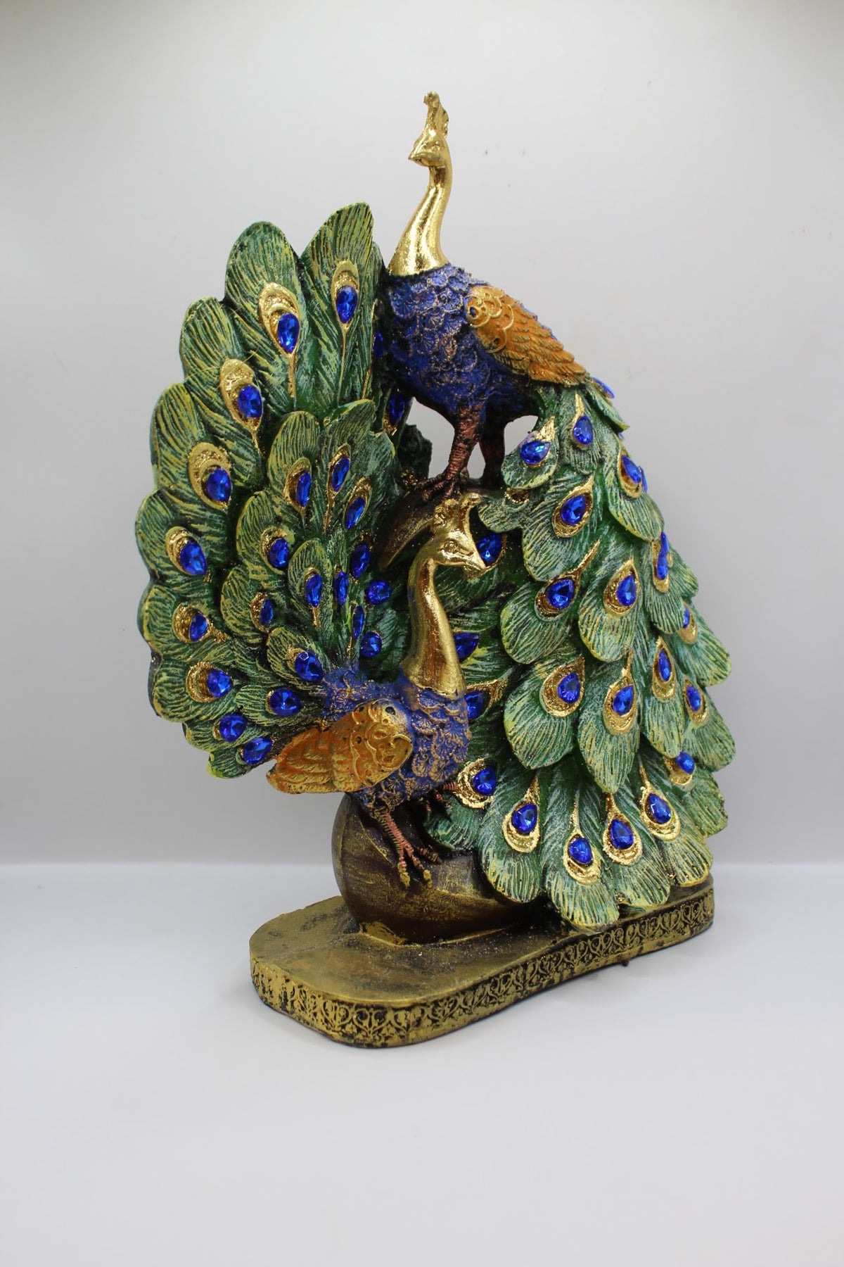 Resin peacock pair statue, left side view