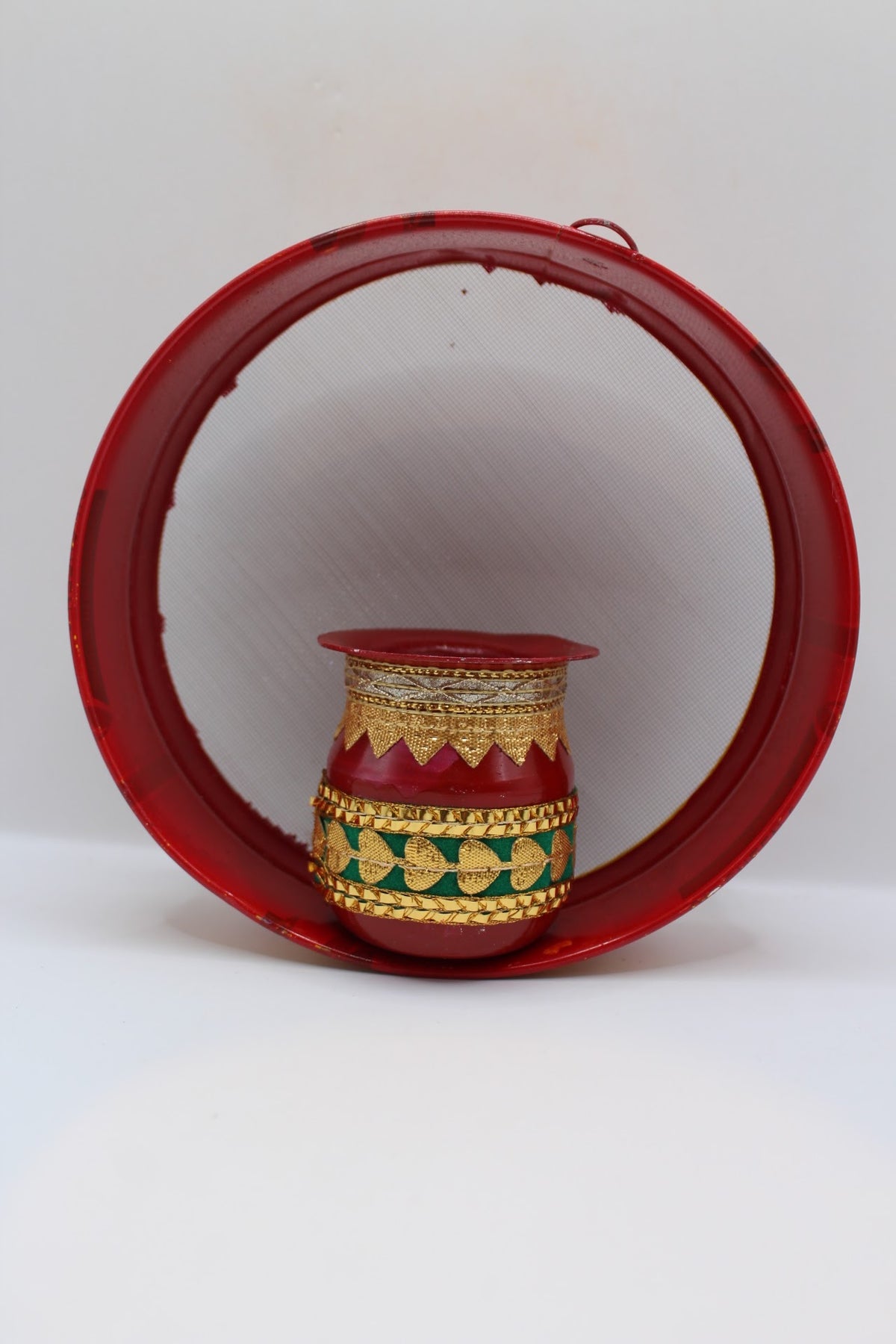 Red Karwa Chauth set with yellow fringe, thali, channi and lota, side view
