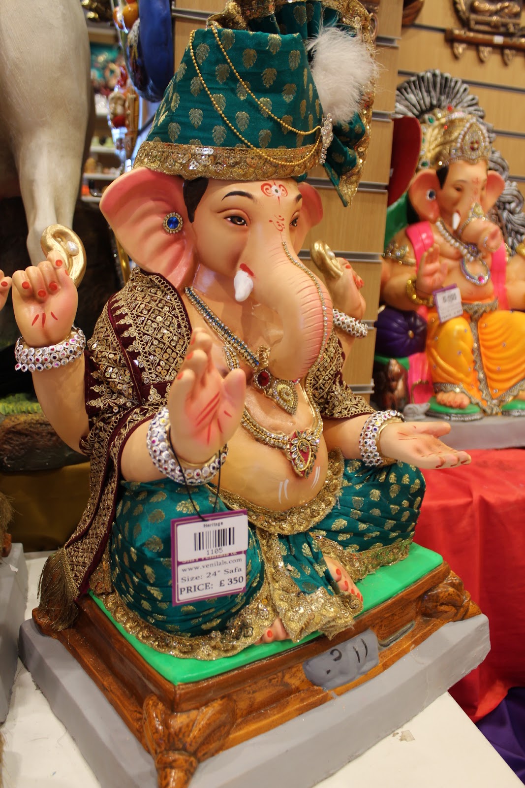 Eco-Friendly Ganesh Visarjan idol, Teal & Maroon, close-up