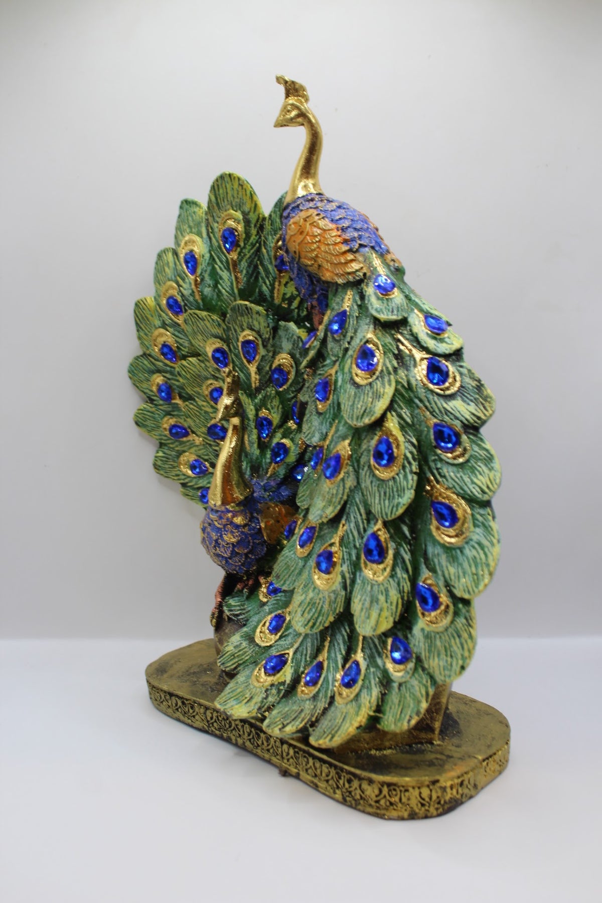 Resin peacock pair statue, right side view