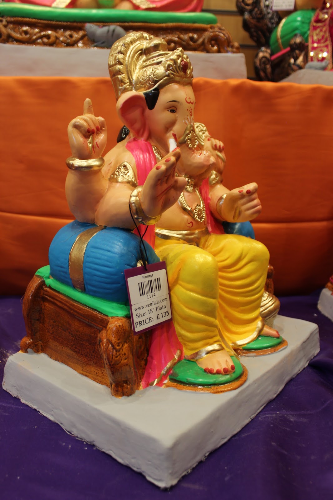 Eco-Friendly Ganesh Visarjan idol, Yellow & Pink Drum Base, close-up