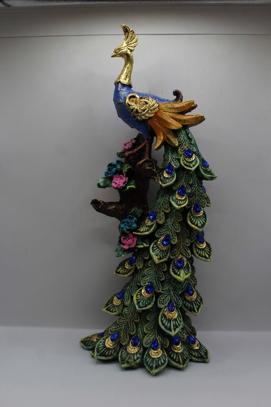Tall resin peacock on tree statue, front view