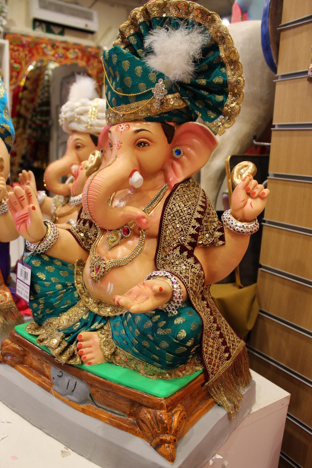 Eco-Friendly Ganesh Visarjan idol, Teal & Maroon, side view