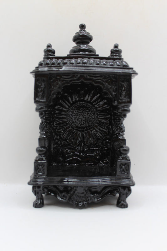 Small black mandir, front view