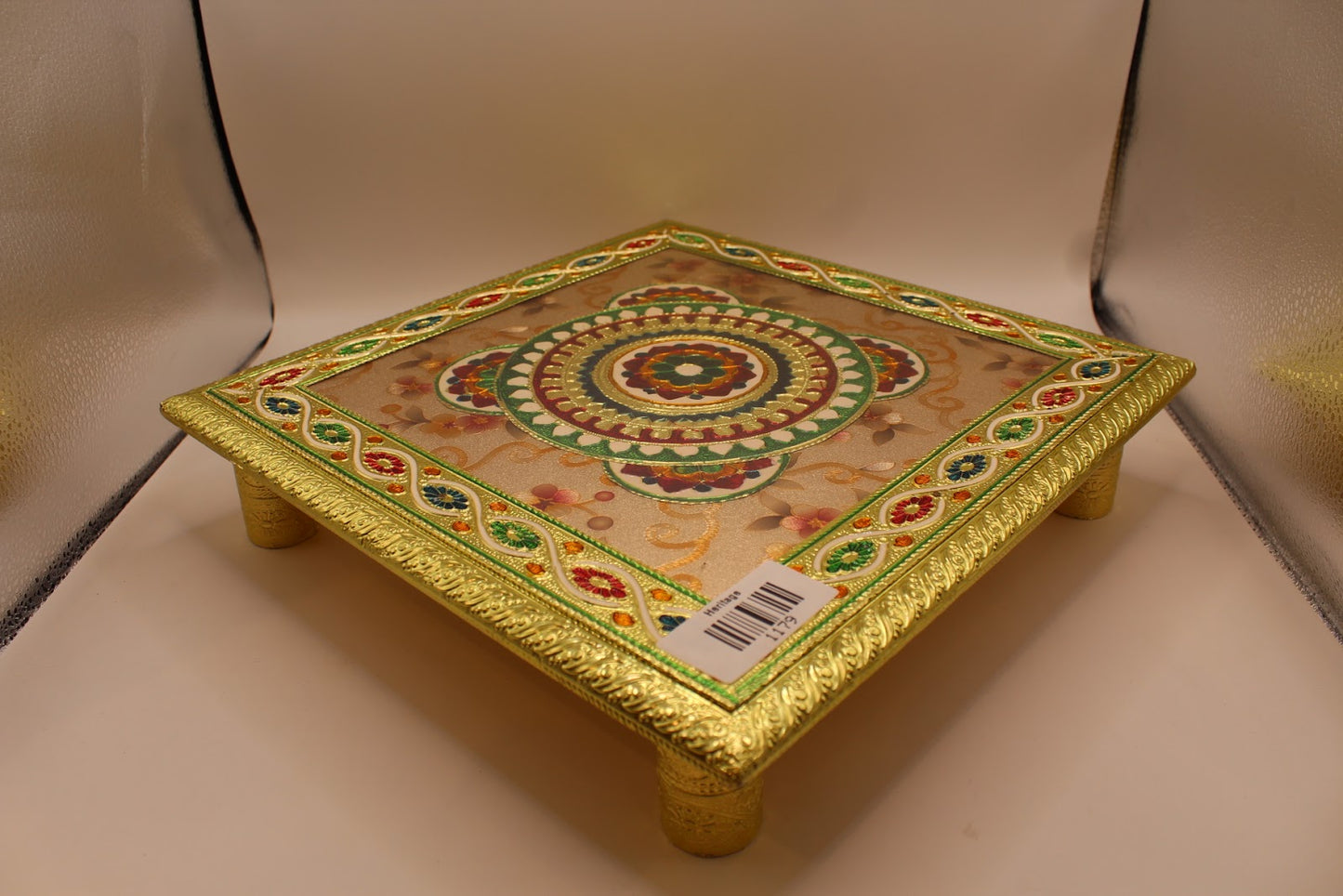 Floral meenakari chowki angled view with gold cylindrical legs