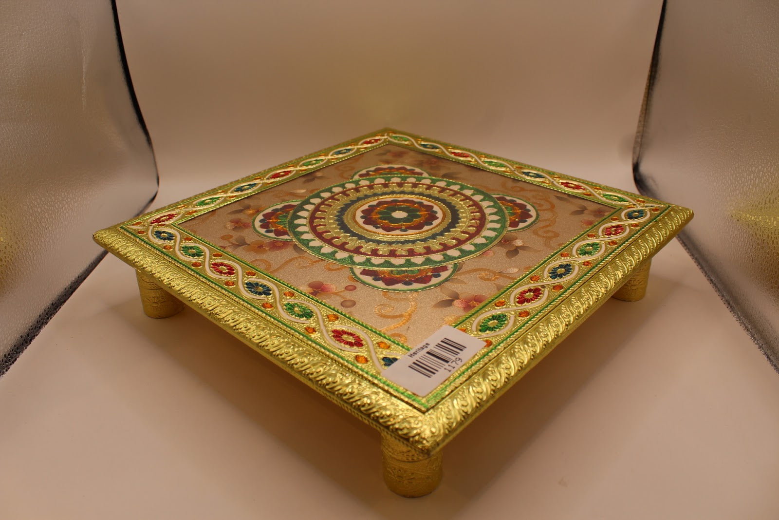 Floral meenakari chowki angled view with gold cylindrical legs