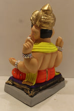 Load image into Gallery viewer, Eco-friendly clay Ganesh idol in jewellery style with yellow khes and orange dhoti, back view