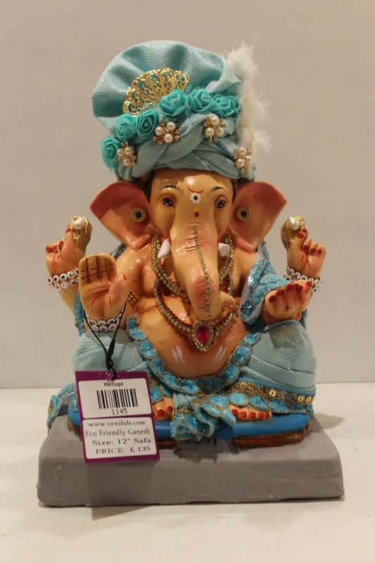 Eco-friendly clay Ganesh idol with sky blue safa and pearls, front view