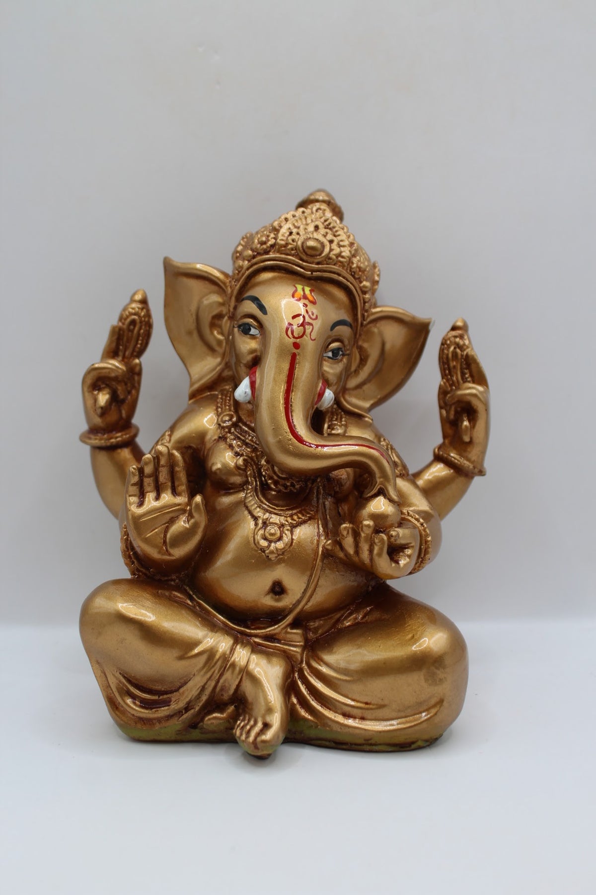 Copper gold resin Ganesh murti seated, front view