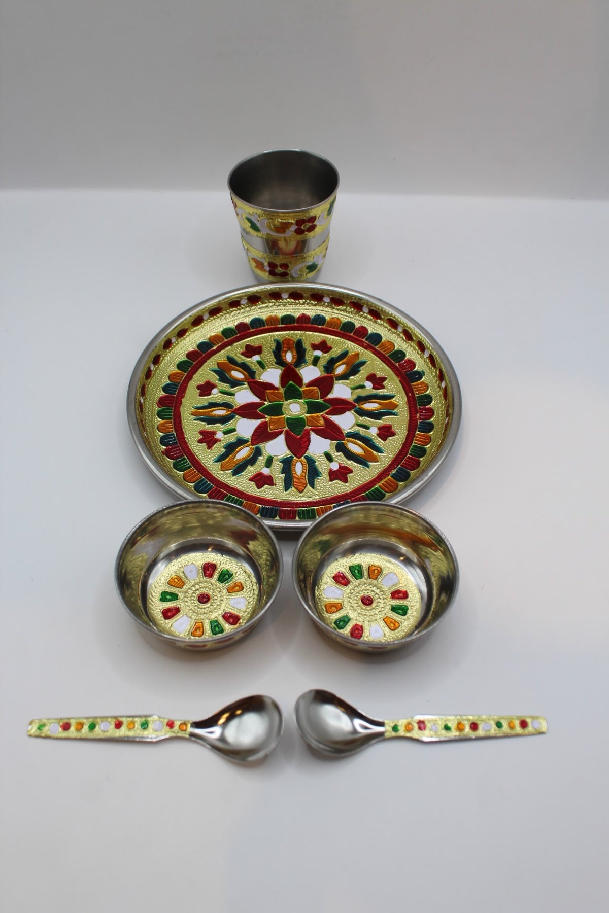 Meenakari pooja set No. 1 with thali, bowls, glass and spoons, side view