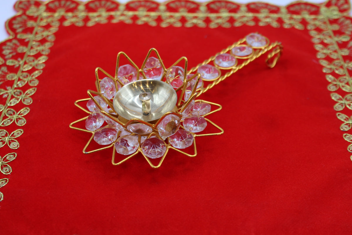 Stone-set lotus aarti diya, angled view