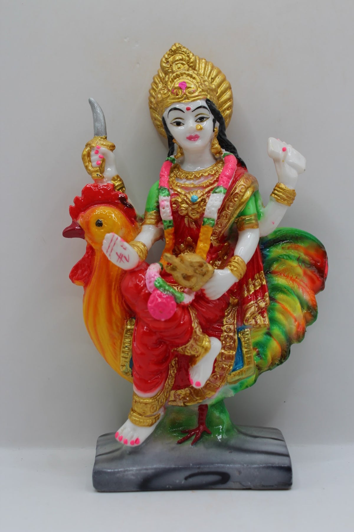 Resin Bahuchar Maa murti riding a rooster, front view