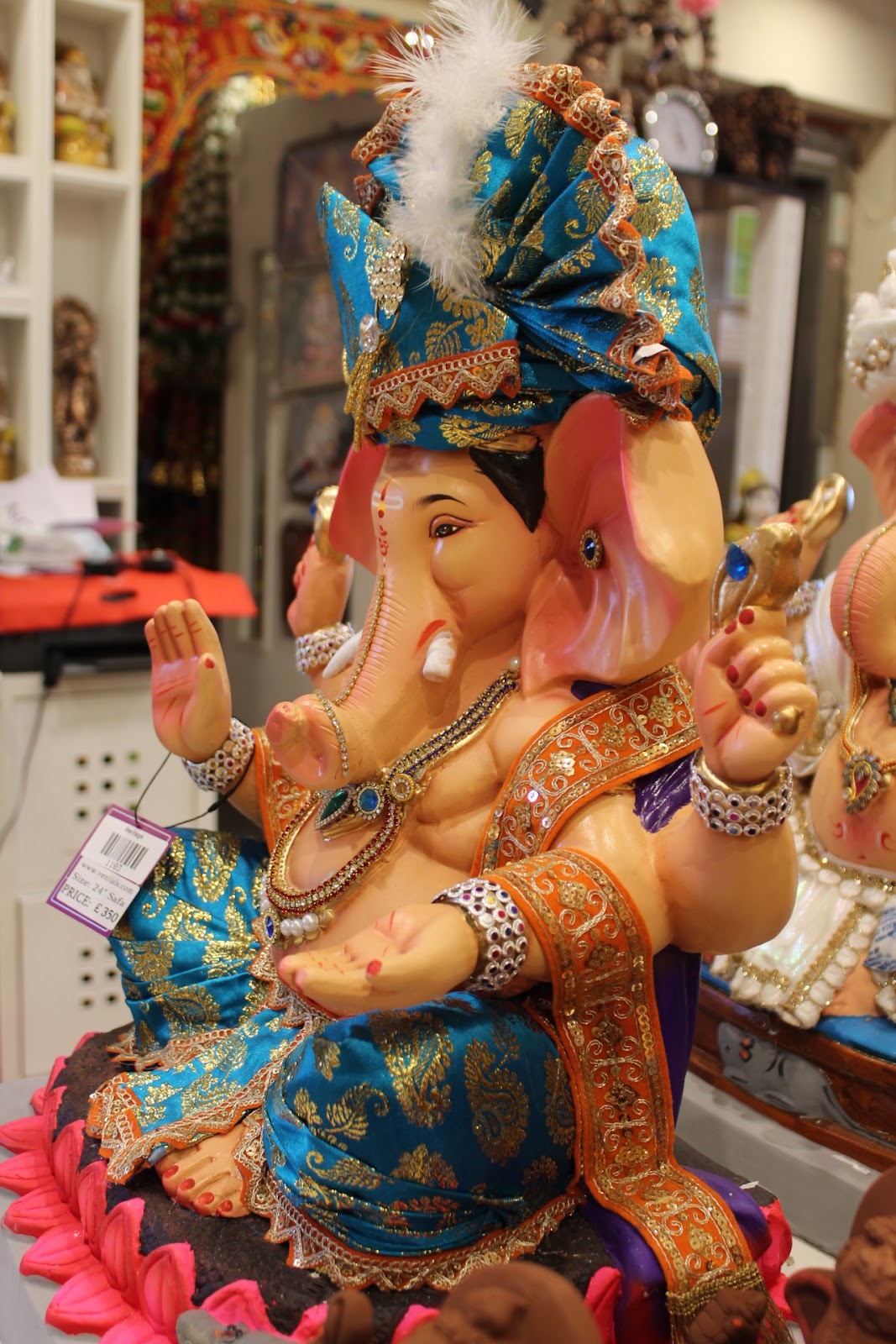 Eco-Friendly Ganesh Visarjan idol, Teal & Gold, side view