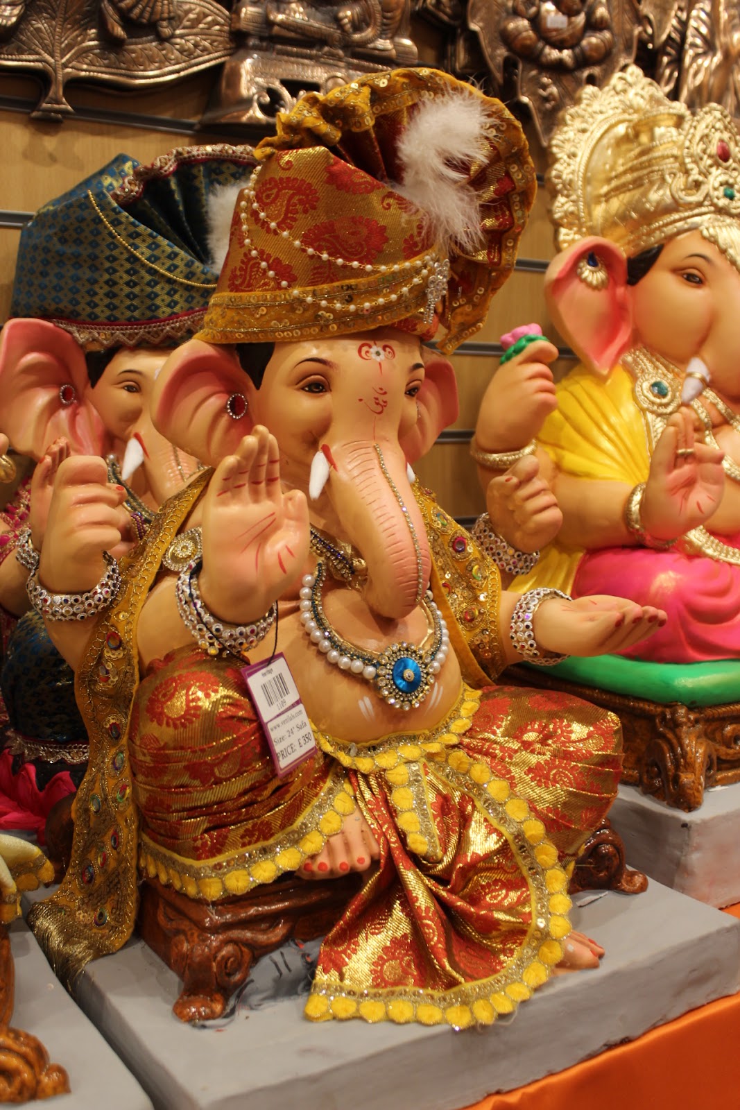 Eco-Friendly Ganesh Visarjan idol, Rust & Gold, close-up