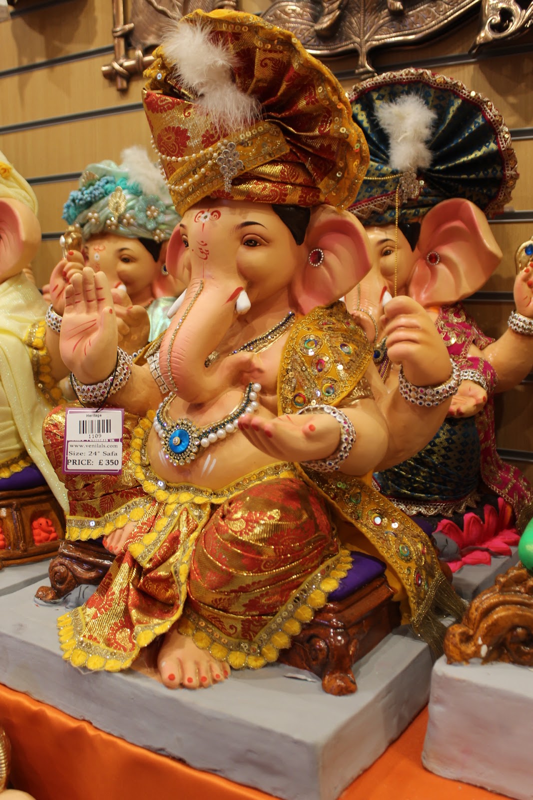 Eco-Friendly Ganesh Visarjan idol, Rust & Gold, side view
