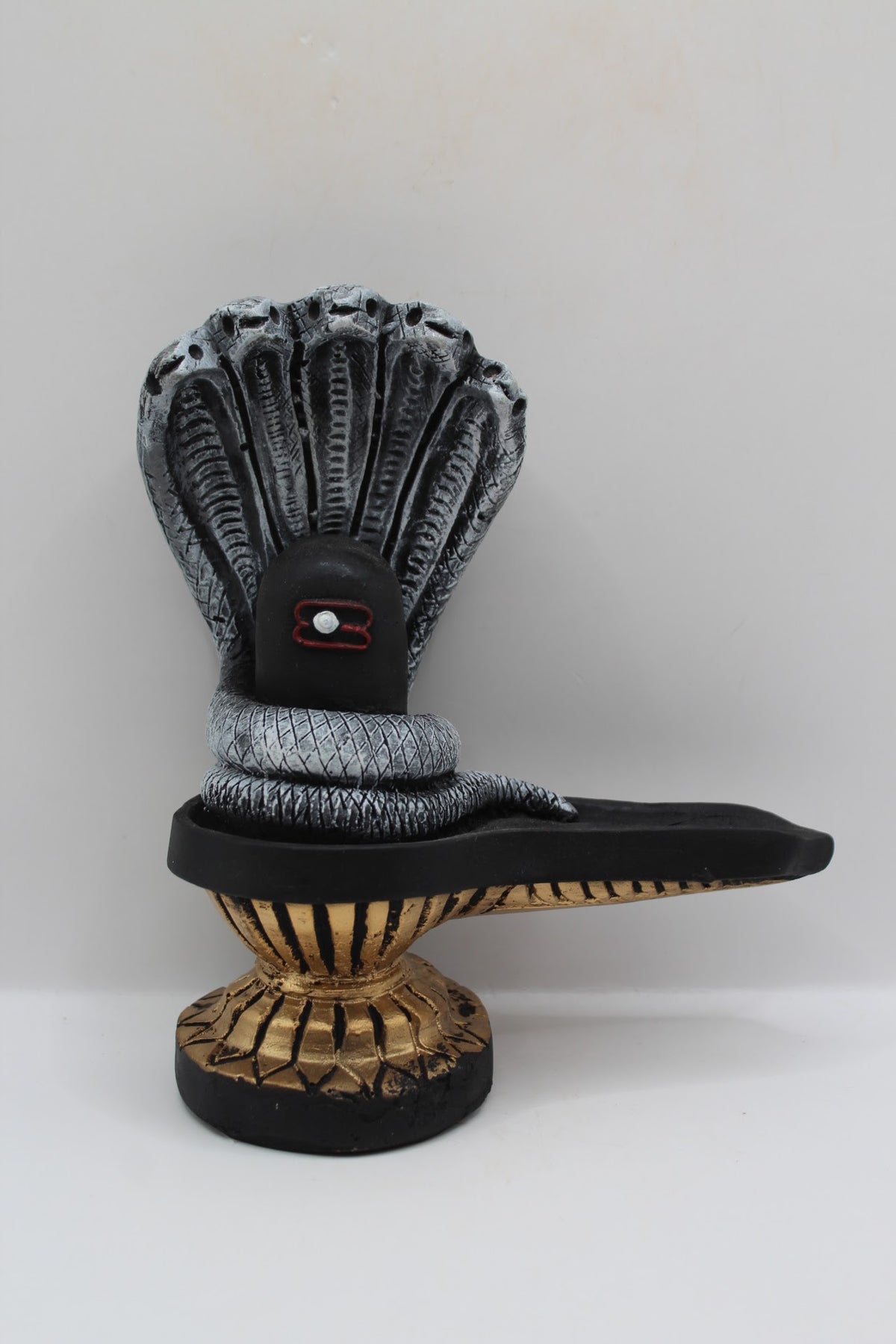 Black resin Shivling with Sheshnaag, front view