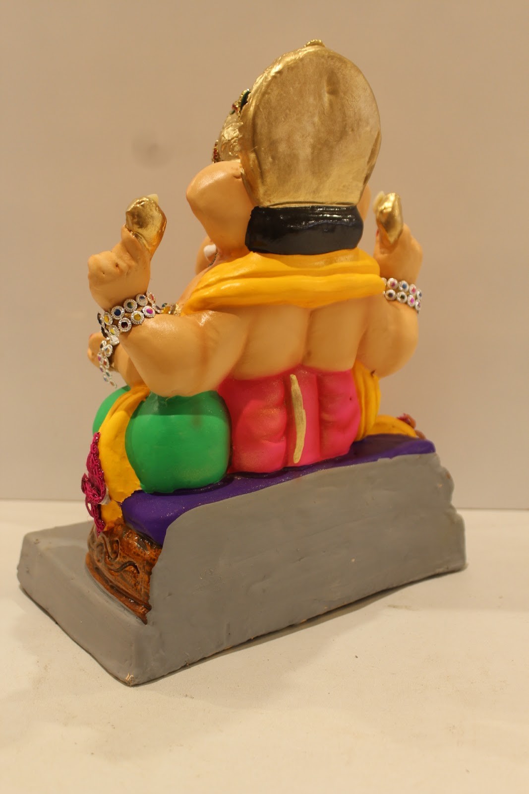 Eco-Friendly Ganesh Idol – Jewellery Style, Pink Dhoti, Basket Throne, ~12 inch
