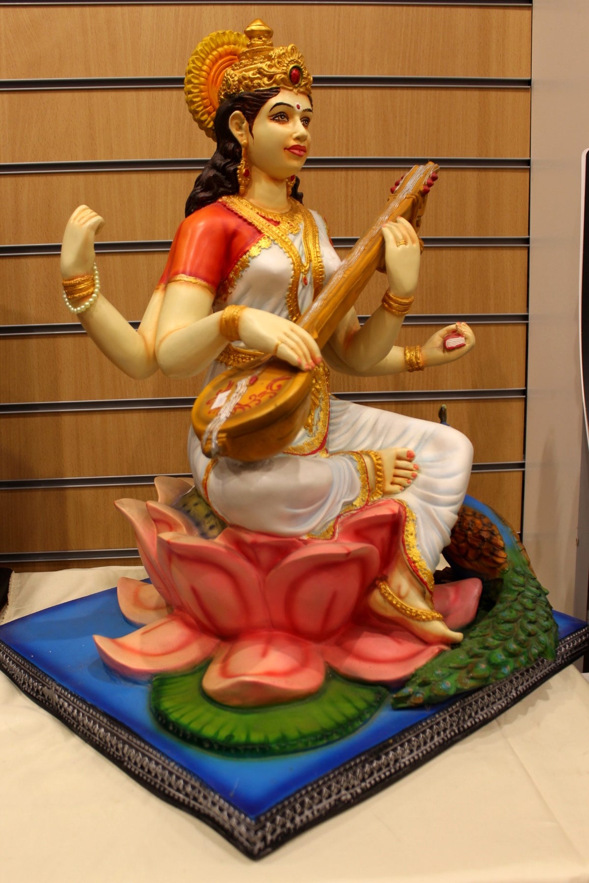 Resin/Fibre Saraswati Statue for Home Temple – Veena on Lotus with Peacock, 25 inch