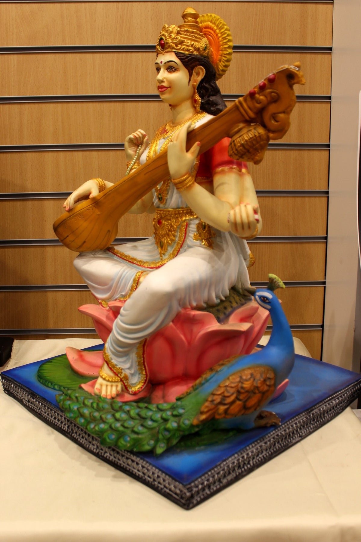 Resin/Fibre Saraswati Statue for Home Temple – Veena on Lotus with Peacock, 25 inch