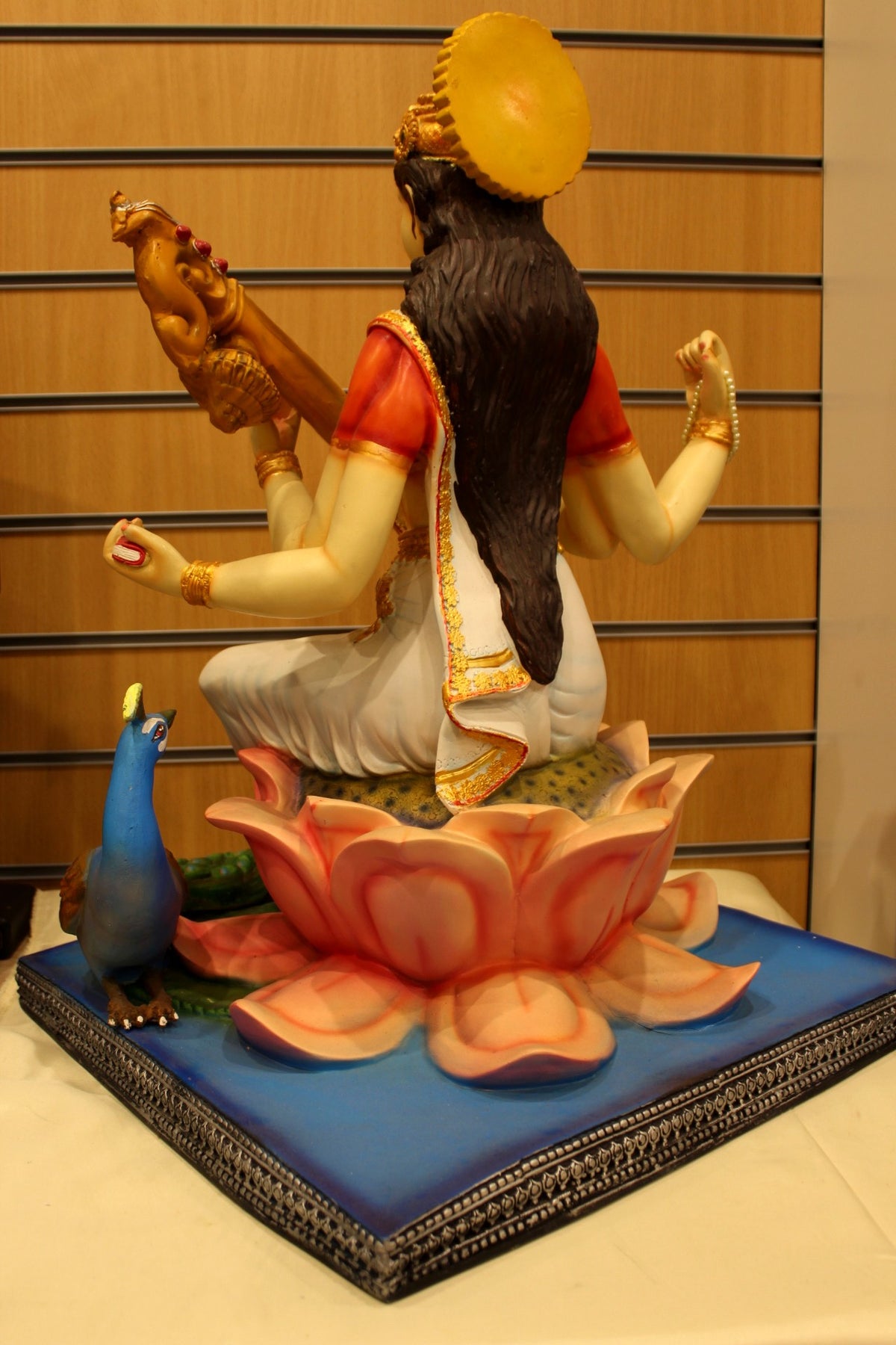 Resin/Fibre Saraswati Statue for Home Temple – Veena on Lotus with Peacock, 25 inch
