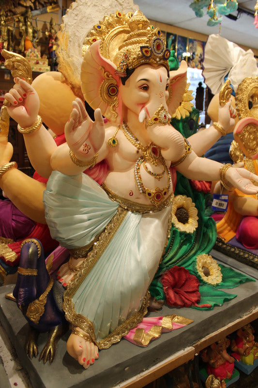 POP Ganesh Visarjan idol, dancing pose with floral peacock backdrop, side view