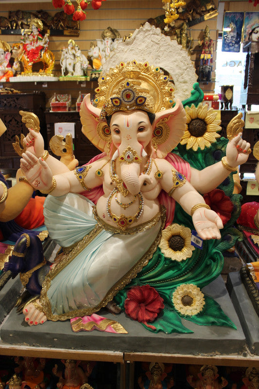 POP Ganesh Visarjan idol, dancing pose with floral peacock backdrop, detail view