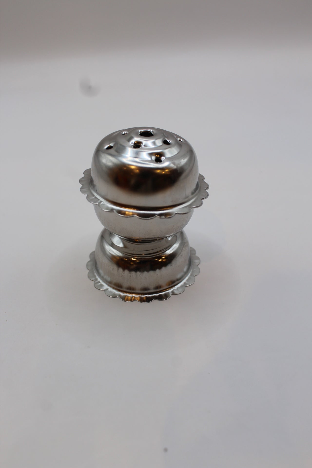 Stainless steel agarbatti incense stick stand, top view of holder