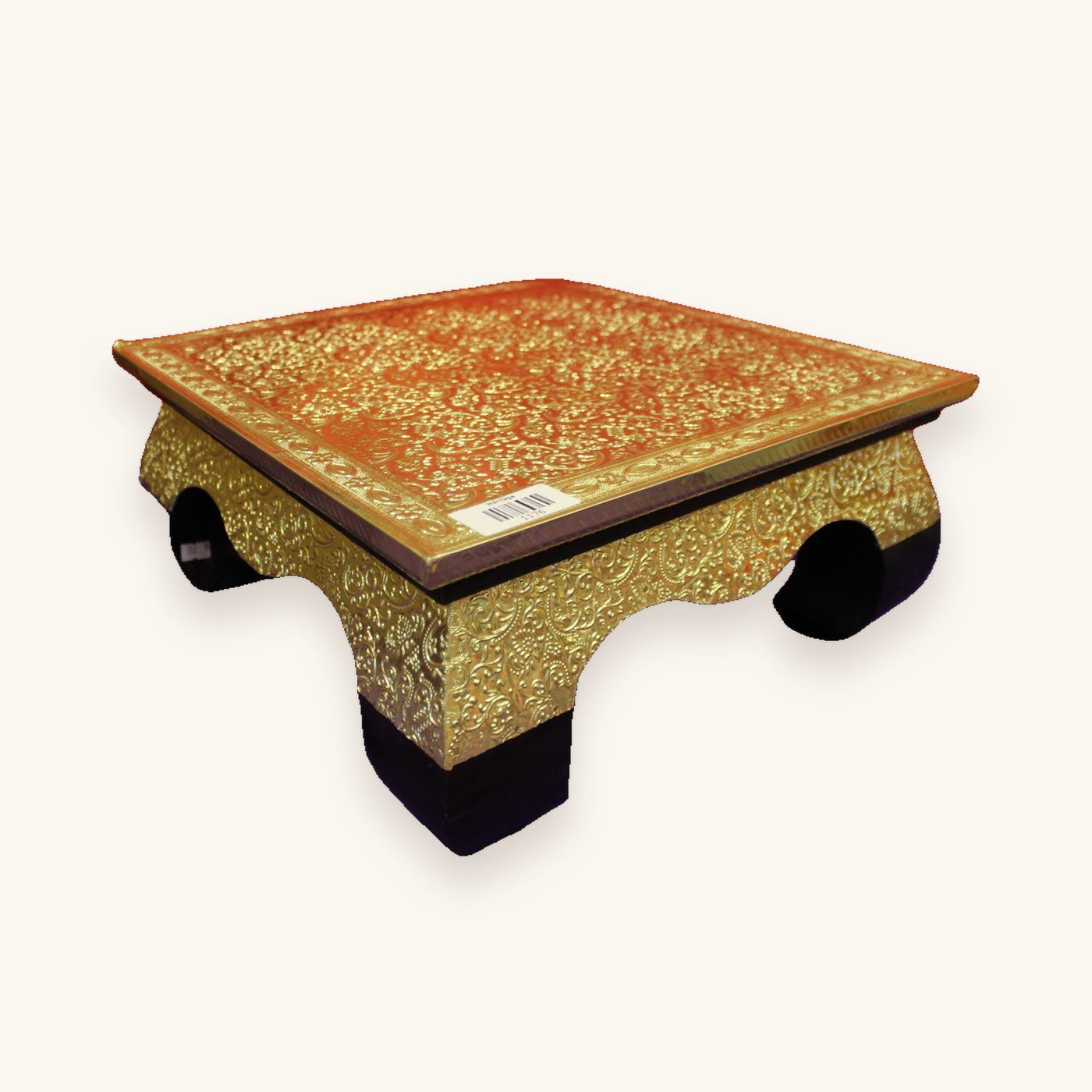 Gold embossed bajot with arched apron, angled view