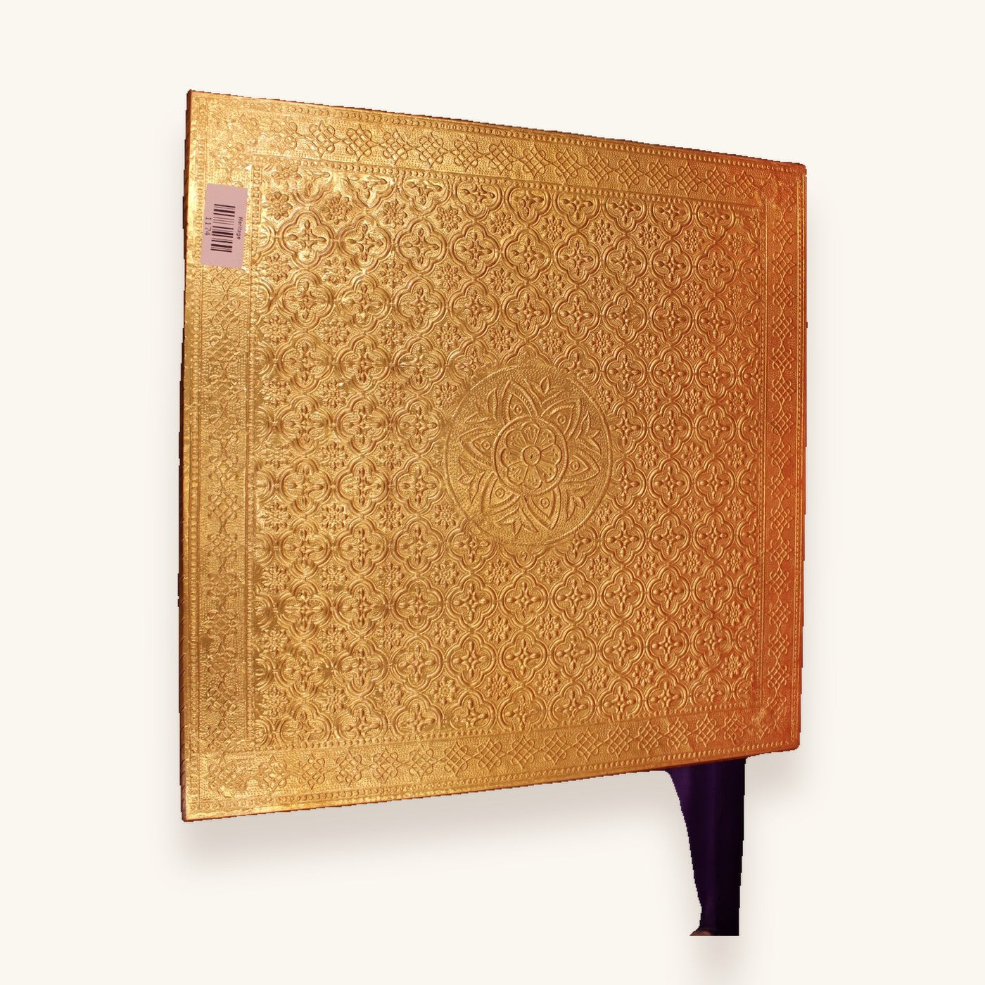 Gold embossed bajot, top-down view of the floral medallion top