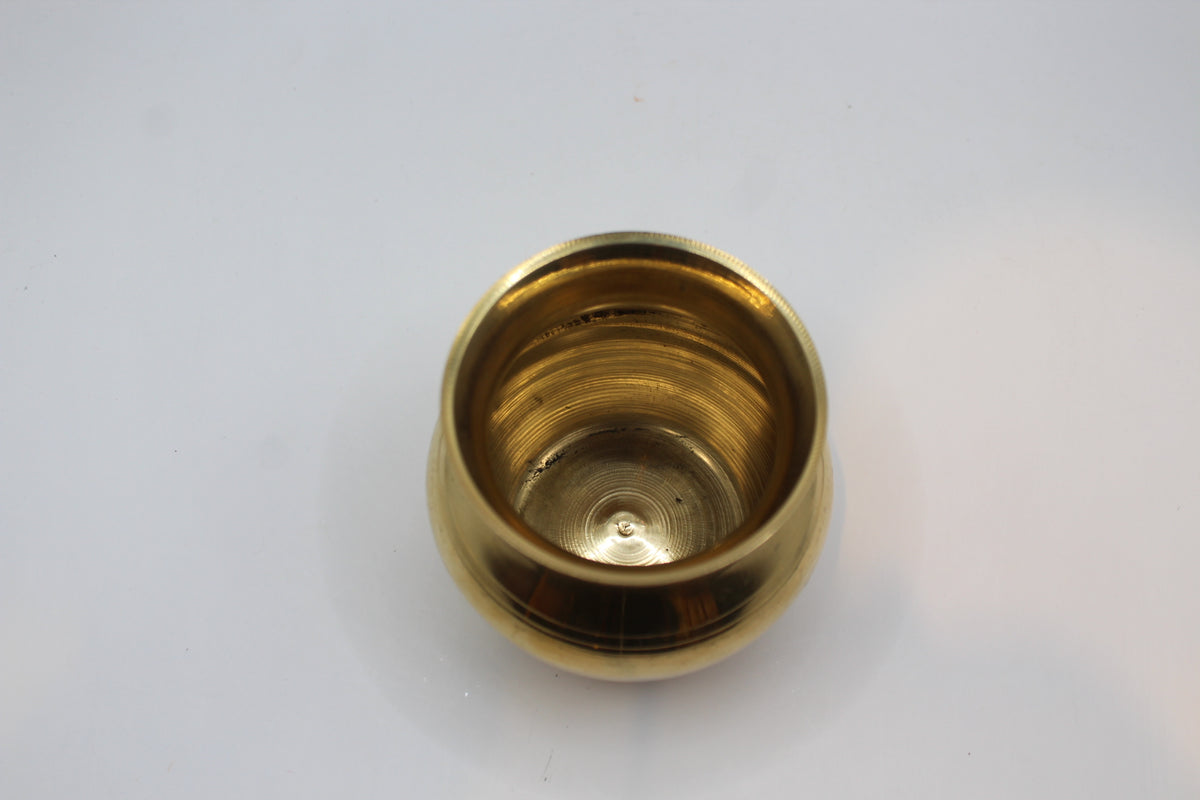 Medium brass lota, inside view