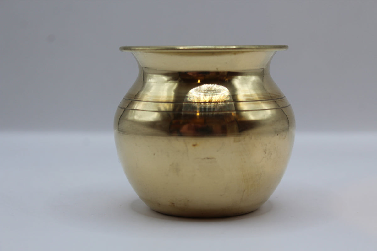 Small brass lota, front view