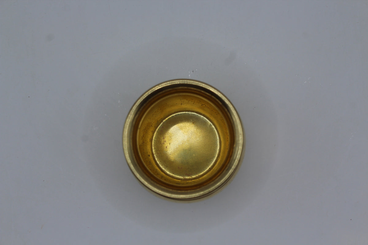 Small brass lota, inside view