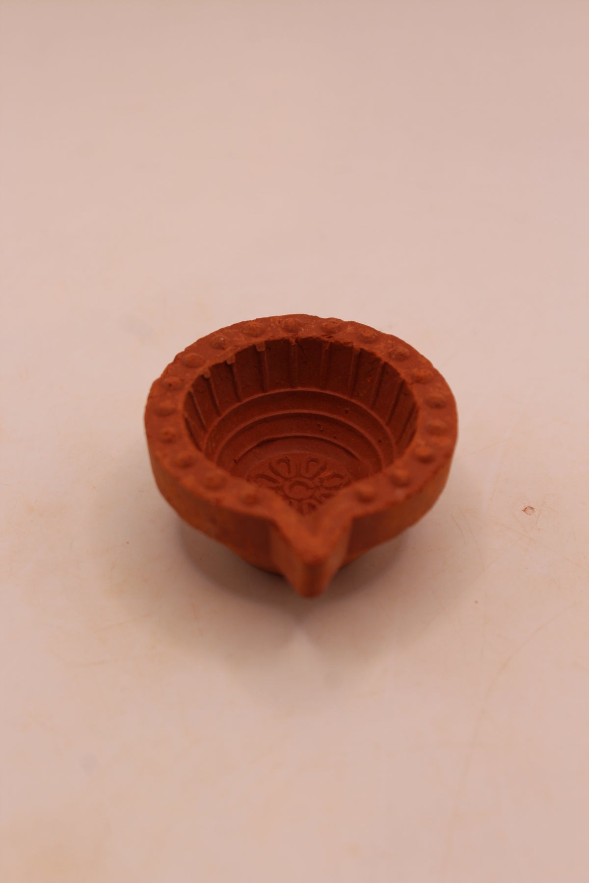 Extra Small clay diya, above