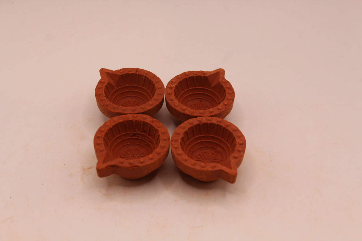 Extra Small clay diya, front