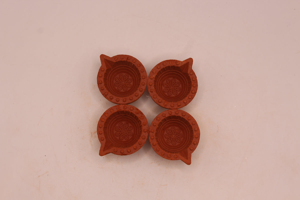 Extra Small clay diya, right