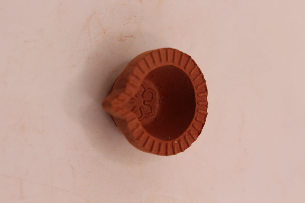 Extra Small clay diya, back