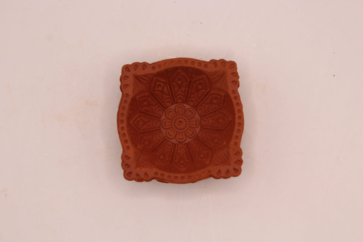 Four Face Pointed Corners clay diya, above