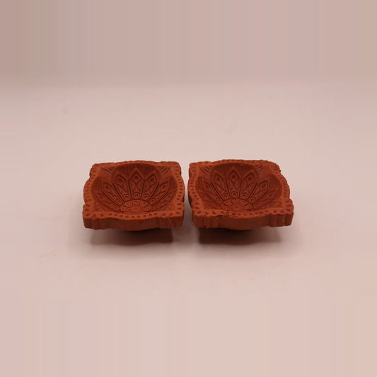 Four face clay diya, pack of 2