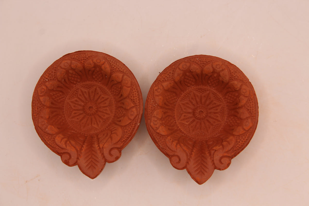 One Face Floral clay diya, above