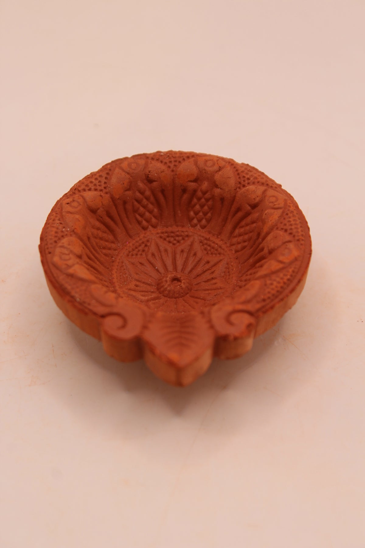 One Face Floral clay diya, back